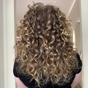 Cheveux bouclés - Tuccinardi
